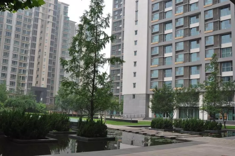 هتل Beijing New Oriental Suites In Seasons Park Sanlitun