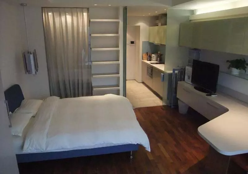 هتل Beijing New Oriental Suites In Seasons Park Sanlitun
