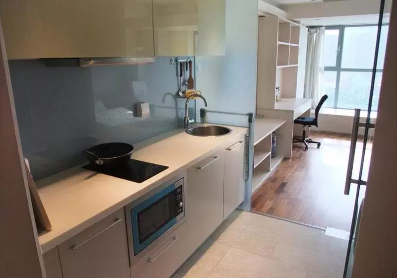 هتل Beijing New Oriental Suites In Seasons Park Sanlitun