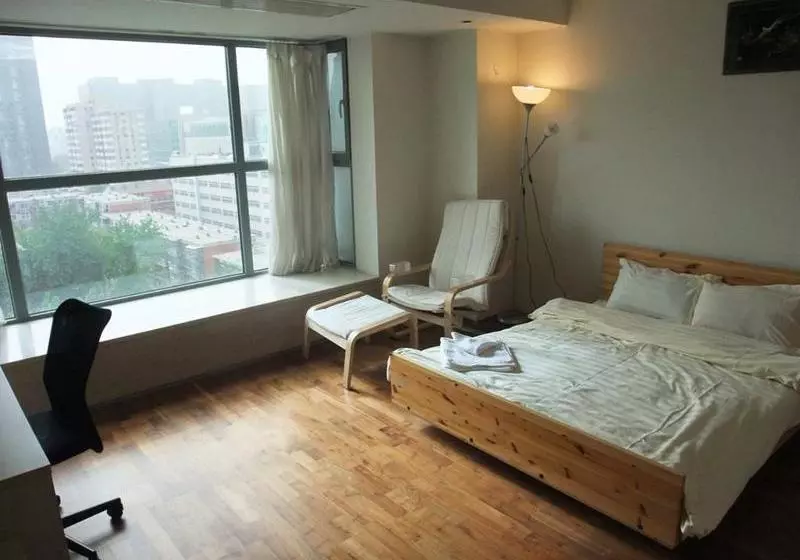 هتل Beijing New Oriental Suites In Seasons Park Sanlitun