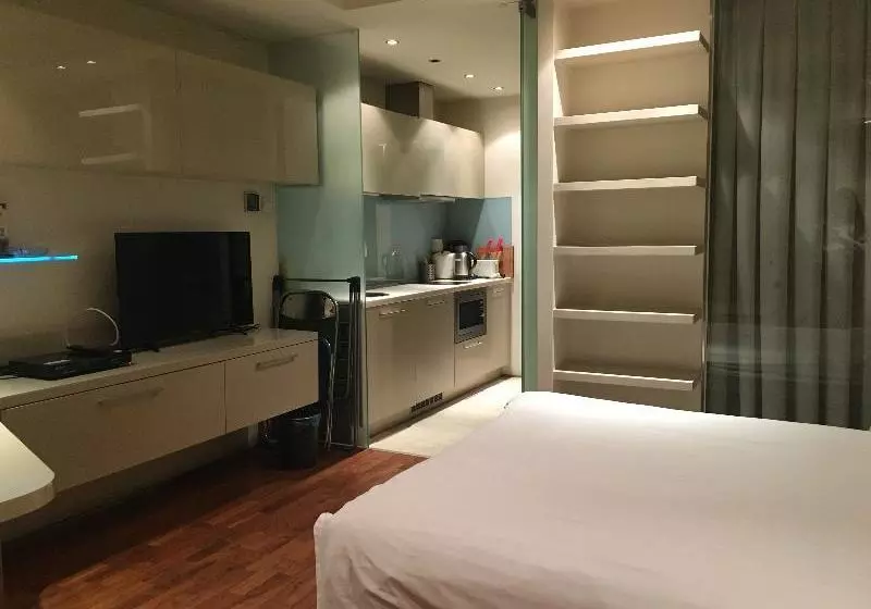 هتل Beijing New Oriental Suites In Seasons Park Sanlitun