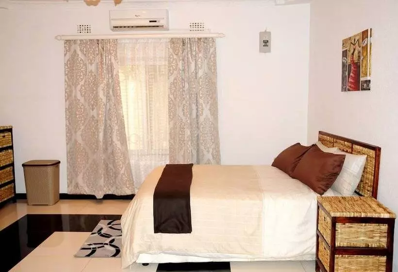 تختخواب و صبحانه Melunah Lodge