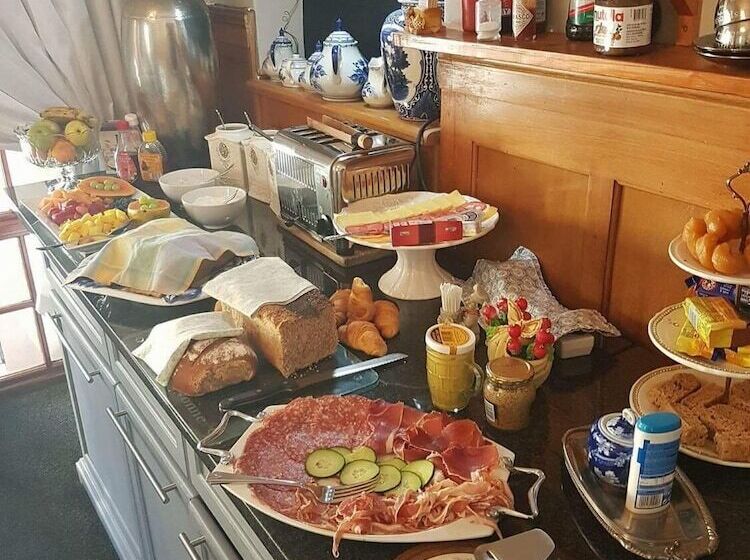 펜션 Mulligans Guest Lodge