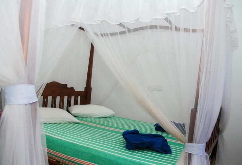 펜션 Tithira Guest House