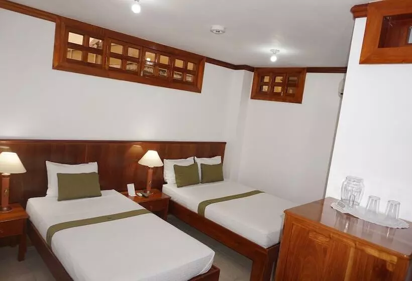 تختخواب و صبحانه Hostal Macaw