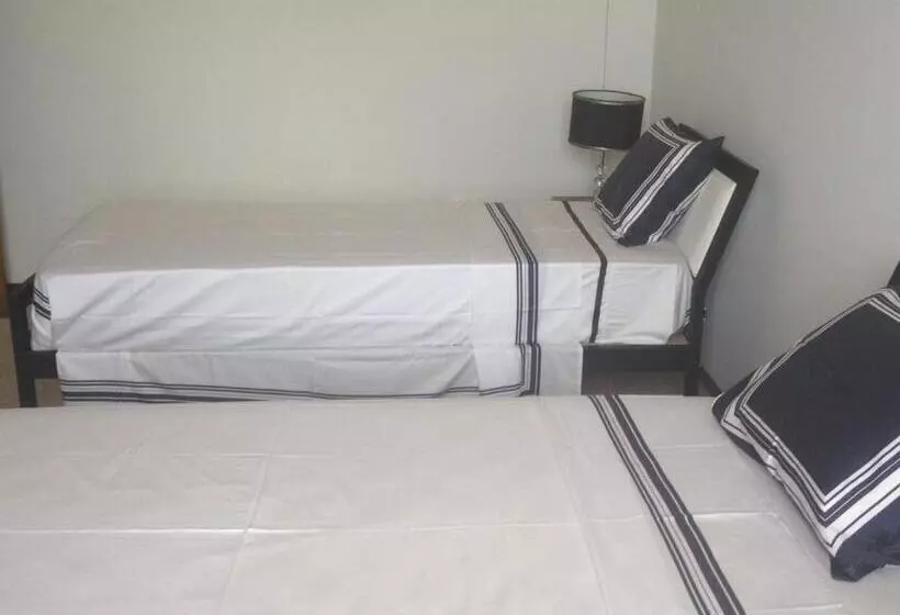 تختخواب و صبحانه Residencial Monte Cara