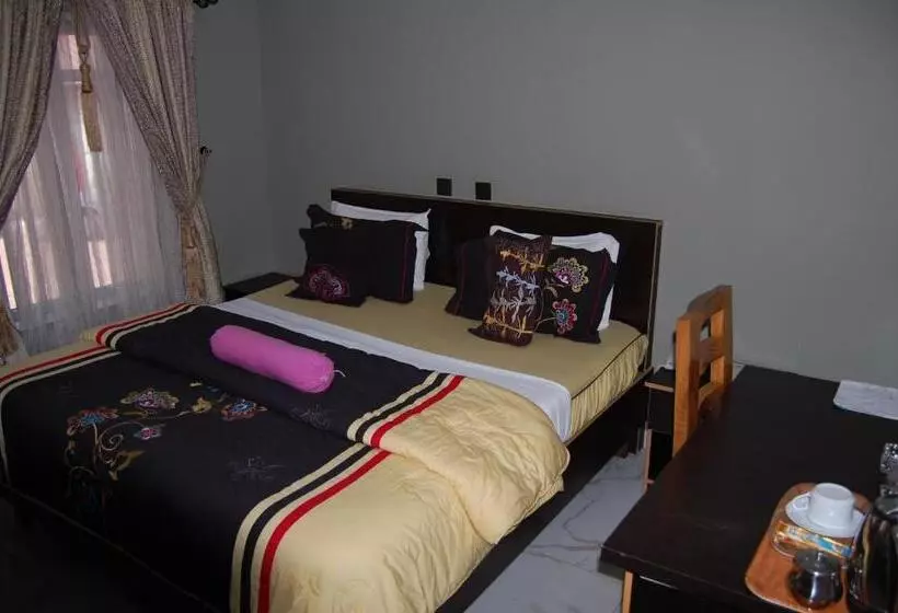 Nue Crest Hotels & Suites