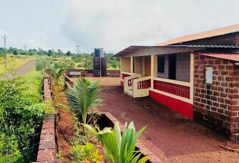ホテル Divekar Aamrai   A Farmhouse In The Arms Of Kokan