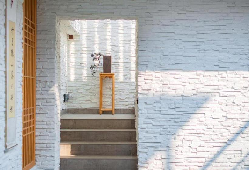 צימר Dali Mu Yun Inn