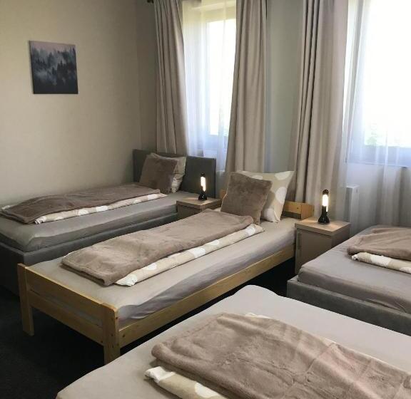 Pensionat 4 Hálószobás Pihenj Meg Vendégház