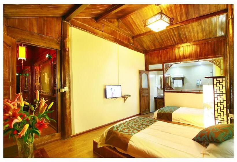 펜션 Lijiang Three Wells Inn