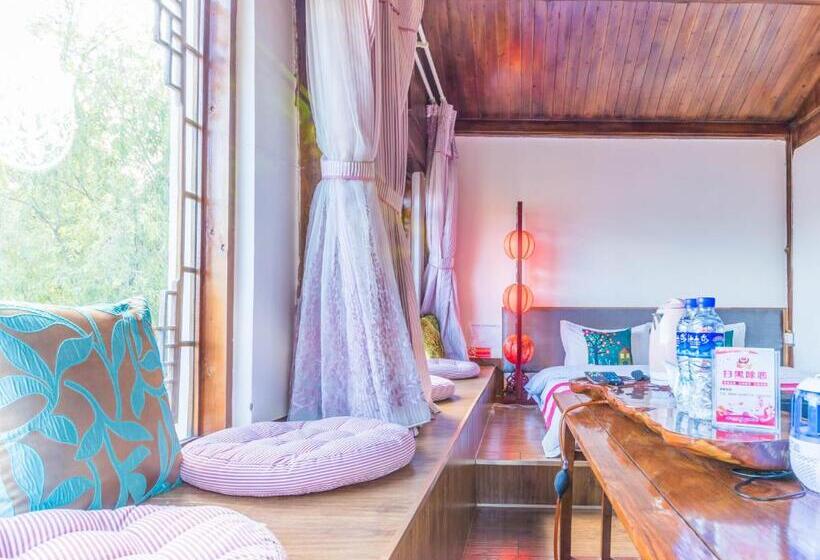 펜션 Lijiang Three Wells Inn