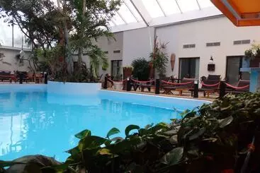 בית מלון כפרי Tropical