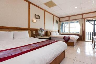 تختخواب و صبحانه Tzu Hsin Garden