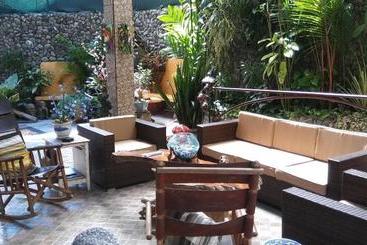 Pension (Hôtel basse catégorie) Coyaba Tropical Elegant Adult Guesthouse
