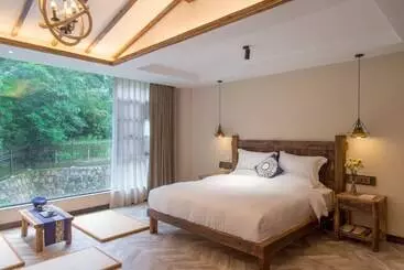 Pensión Puer Xiangtu Story Manor