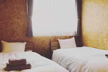 پانسیون 海と山に囲まれた静かな港町の オーシャンビュー 個室ゲストハウスeat&stay Romey