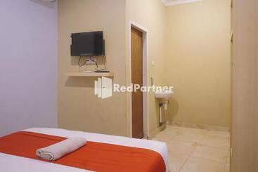 호텔 Tassa Homestay Syariah Mitra Reddoorz