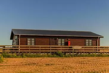 Pensione Riverfront Lodge Hella