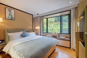 هتل Wuhua Xingxiang Shanfang