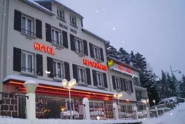 ホテル Logis Hôtel Le Beau Site