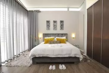 Urban Oasis Apartments At Paragon