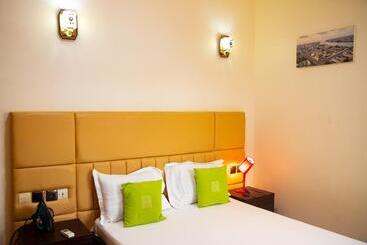 هتل آپارتمان Imolease Kouessi Menontin