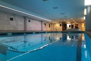 Курорт Macdonald Dona Lola Club