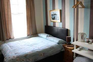 Отель Angel Guest House