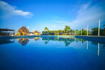 בית מלון כפרי Encanto Riviera Condo