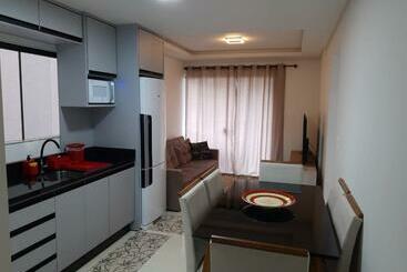 Жильё для туристов Praia Apto Novo ótimo Preço Em Palmas Sc