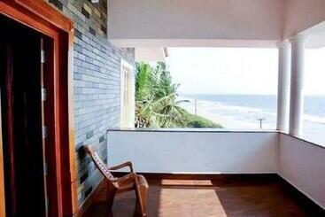 בית מלון כפרי Sea Breeze Beach Inn