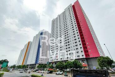 Отель Redliving Apartemen Green Pramuka Aokla Property Tower Orchid