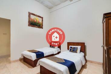 호텔 Spot On 91752 Izzami Homestay Syariah