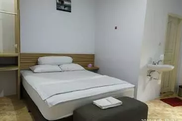 Herberge Penginapan Apex