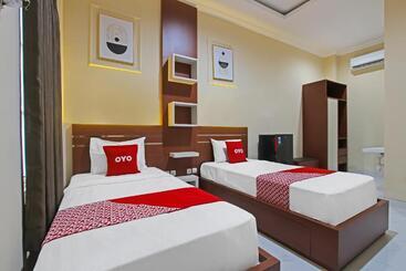 Отель Capital O 92105 A Shanti Inn