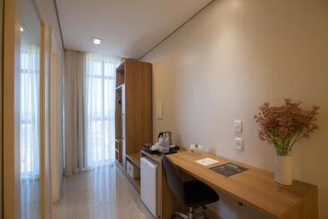 Отель Nobile Suites Gran Lumni