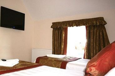 Отель East Gate Inn