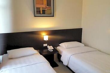 فندق Manhattan Suites Inn