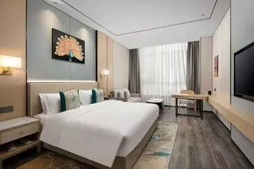 Hotelli Ramada Encore By Wyndham Xishuangbanna Jinghong