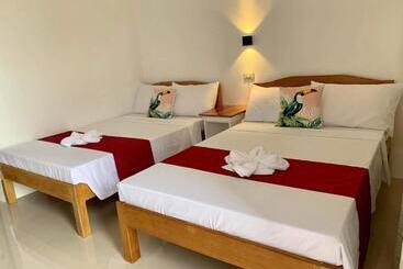 בית מלון כפרי Sunshine Stay Panglao