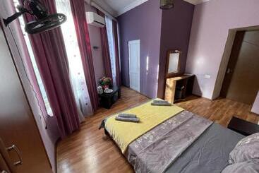 Pension (Hôtel basse catégorie) Big Family