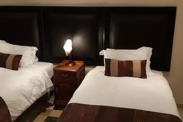 ペンション Magaliqua Guest House