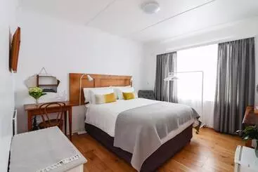 펜션 Whispering Oaks Guest House