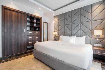 هتل Boardroom Apartments