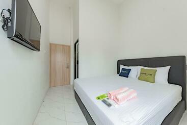 Urbanview Hotel La De Grizz Syariah Sampit By Reddoorz