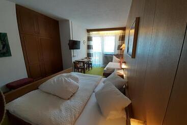 Отель Haus Am Brunnen