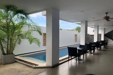 One World One Home Naiharn Hotel By Zuzu