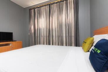 Пансион Reddoorz Plus @ Kelapa Dua Kebon Jeruk