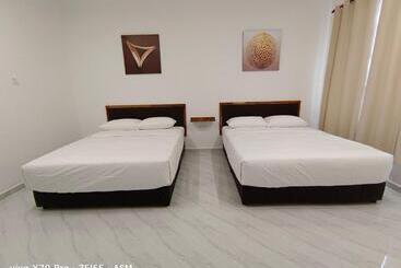 Pensió Asm Roomstay 4 2 Queen Beds